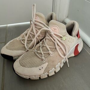 Light pink Nike sneakers (worn)
